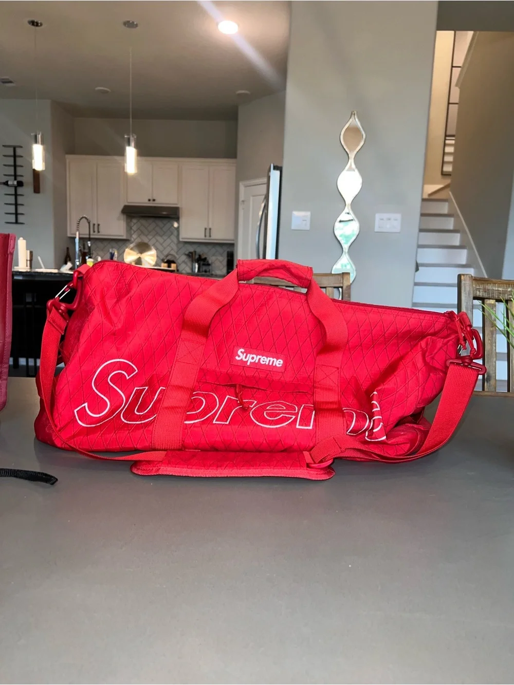 Supreme Red Duffel Bag with Shoulder Strap